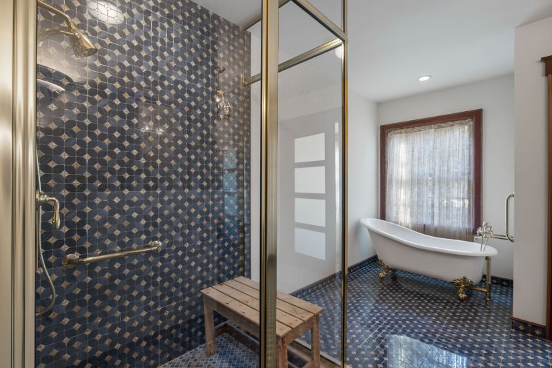 Bathroom with Geometric Tile Accent Wall